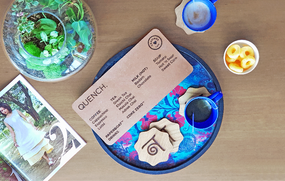 Mood and menu design for Cravings, a café inside Nimaaya women's hospital — Surat, India.